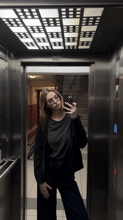 Woman Takes Elevator Selfie in Kragujevac
