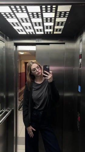 Woman Takes Elevator Selfie in Kragujevac