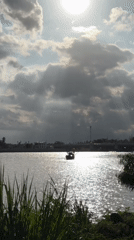 Cai River boats and stormy light, Nha Trang morning