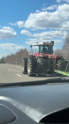 Russian-flagged tractor spotted on highway near Ilyinovka
