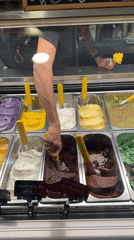 Double-scoop gelato moment at a Milan gelateria