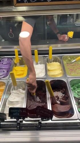 Double-scoop gelato moment at a Milan gelateria