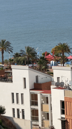 Coastal buildings filmed from elevated view in Orpesa, Spain