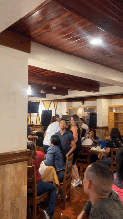 Group dances at Caracas restaurant