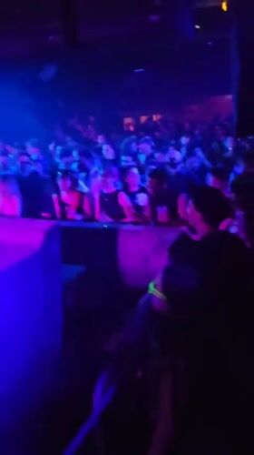 Late-night DJ set at a packed Paris club