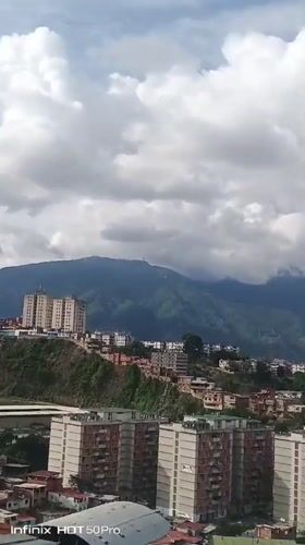 Evening snapshots of Caracas — towers, hillsides, and street life