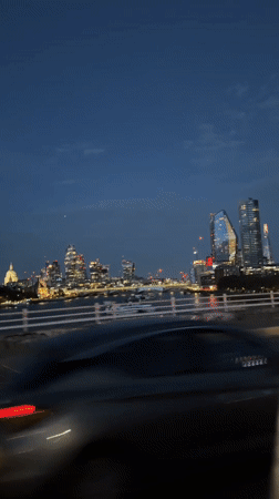 London bridge crossing at dusk, river below
