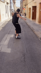 Skateboarders perform tricks on rails and ramps in Terrassa