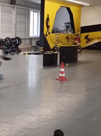 Children practice roller skating at indoor facility in Novosibirsk