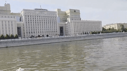 Tourist boat cruise documents Moscow River journey past Kremlin