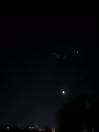 Fireworks display illuminates night sky over Kandahar, Afghanistan