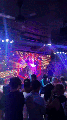 Drag queen performs with backup dancers at Kuta nightclub