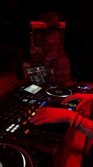 DJ set with red lighting in Moscow