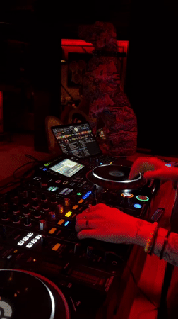 DJ set with red lighting in Moscow