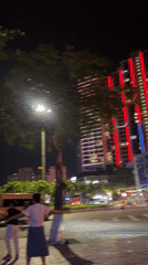 Women hold evening dance class on Nha Trang sidewalk