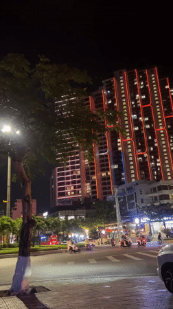 Women hold evening dance class on Nha Trang sidewalk