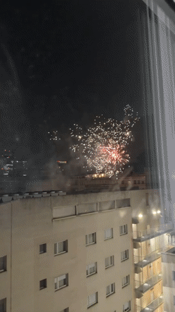 Fireworks light up the Milan skyline at night