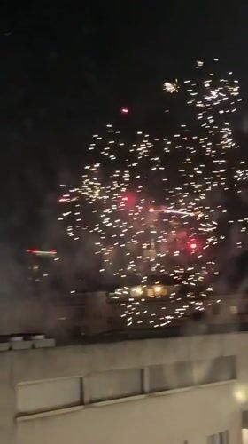 Fireworks light up the Milan skyline at night