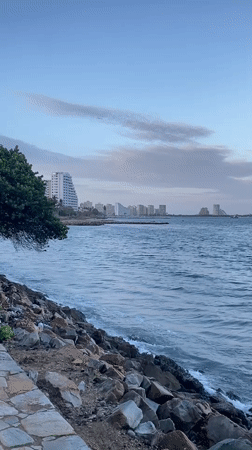Evening waterfront leisure activities documented in Porlamar, Venezuela