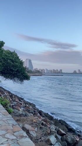 Evening waterfront leisure activities documented in Porlamar, Venezuela