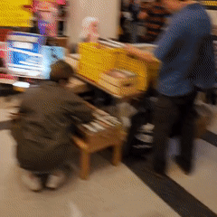 Browsing vinyl and cassettes at an indoor record fair