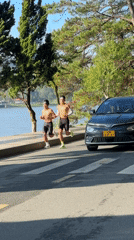 Two men spotted jogging near Xuan Huong Lake, Da Lat