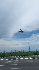 Airport perimeter views near George Town's skyline