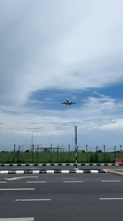 Airport perimeter views near George Town's skyline