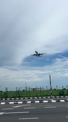 Airport perimeter views near George Town's skyline