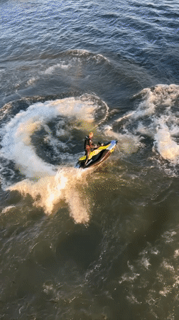 Jet skiers enjoy afternoon recreation on Krasnoyarsk river