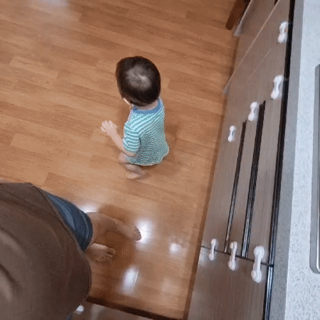 A busy domestic morning in a South Korean home with a toddler.