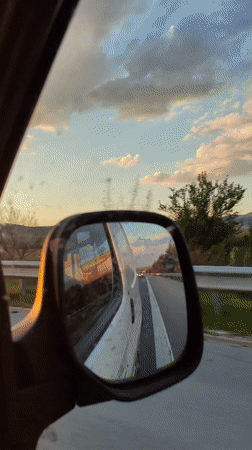 Evening highway drive captured near Kalugerovo, Bulgaria at sunset