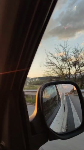 Evening highway drive captured near Kalugerovo, Bulgaria at sunset