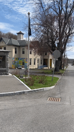 Kingston residents document neighborhood views during cloudy April evening