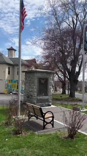 Kingston residents document neighborhood views during cloudy April evening
