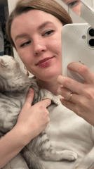 Woman documents quiet moments with kitten in Izhevsk home