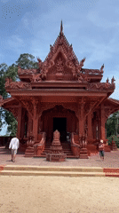 Inside and outside a red temple in Baan Hua Thanon
