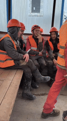 Construction crew breaks and crane work at Sosnoviy Bor site