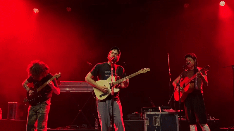 Live band performs 30-minute concert in Milan under colored lights