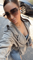 Woman films selfie video near busy Moscow crosswalk