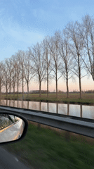 Evening drive captured along canal road in Veghel