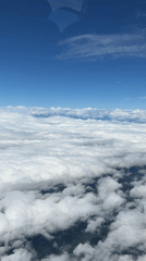 Airplane window view of clouds over Georgia