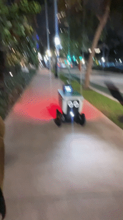 Delivery robot spotted navigating Miami Beach sidewalks at night