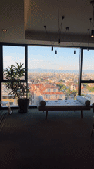 Sofia cityscape viewed through window shows urban sprawl