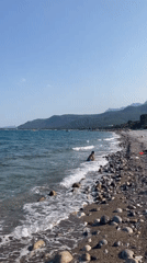 Relaxed afternoon at a rocky Kemer beach, Mediterranean coast