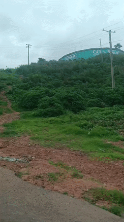 Street-level snapshot of Jos, Nigeria — roads, landmarks, and daily life