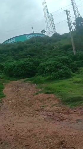 Street-level snapshot of Jos, Nigeria — roads, landmarks, and daily life