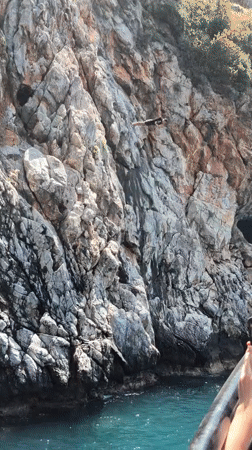 Cliff jumper takes plunge into Turkish waters near Alanya