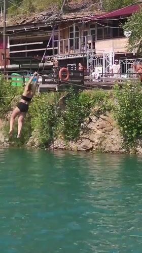Rope swings and zip lines over a Russian quarry lake