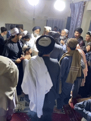 Traditional gathering with food and ceremonies in Kandahar